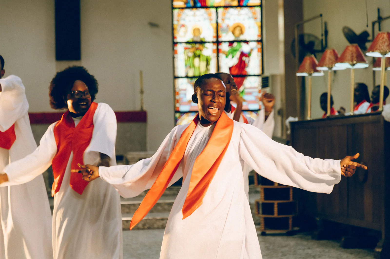 A vibrant gospel choir lifting their voices in song